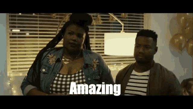 a man and a woman are standing next to each other and the woman says " amazing "
