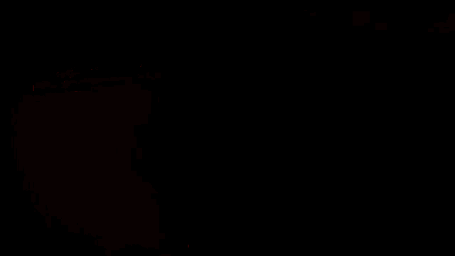 a close up of a car 's rear lights with the letter g on it