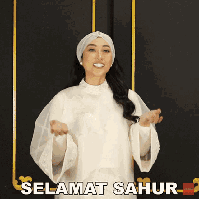 a woman in a white dress with the words selamat sahur on the bottom