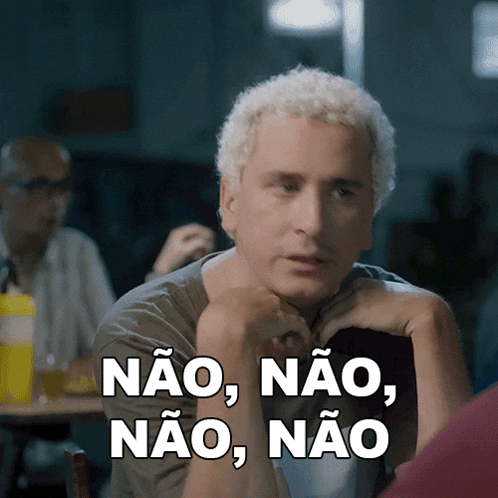 a man with white hair is sitting at a table with the words nao nao nao nao