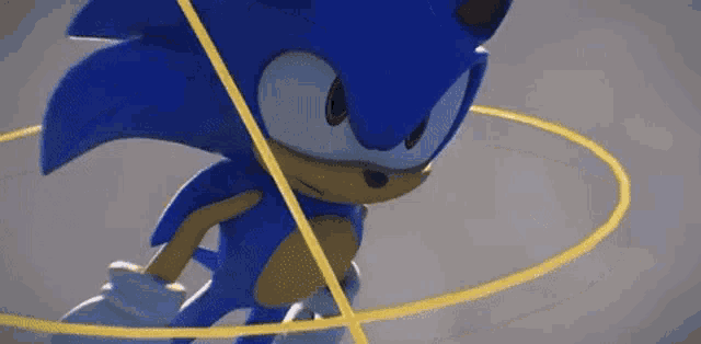 a close up of a sonic the hedgehog 's face with a yellow circle around him .