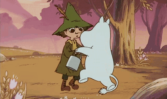 a cartoon character in a green hat is hugging a white animal