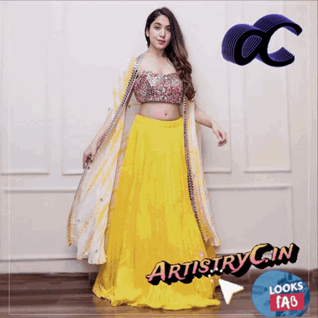 a woman wearing a yellow skirt and a white crop top with artistry gin looks fab