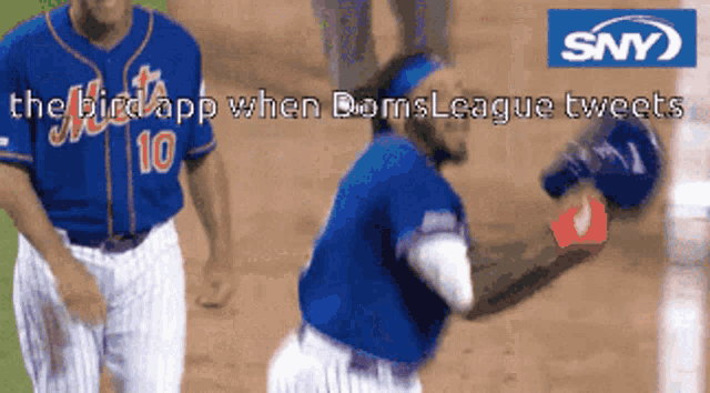 a baseball player wearing a blue mets jersey