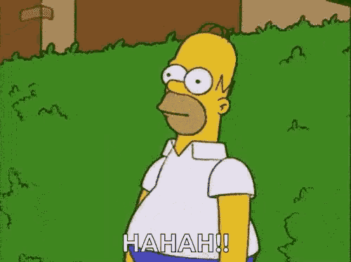 homer simpson from the simpsons is standing in front of a grassy field .
