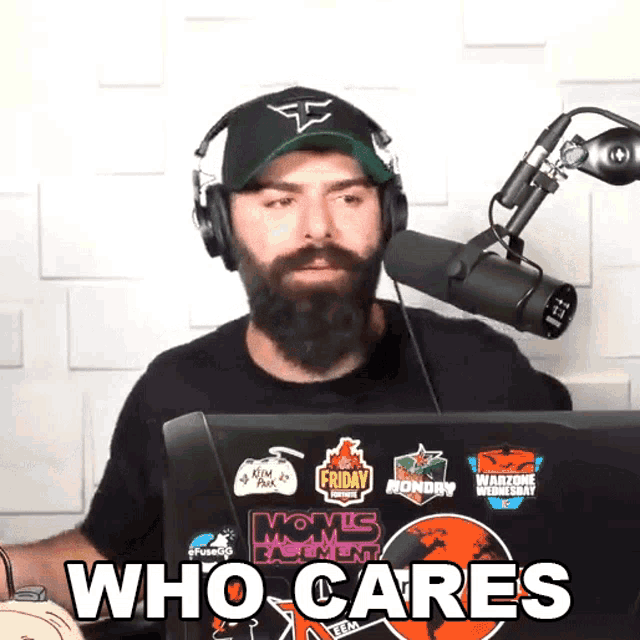 a man with a beard is wearing headphones and a hat with the word friday on it