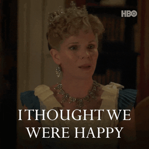 a woman wearing a tiara and necklace says i thought we were happy