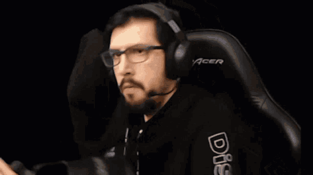 a blurry image of a man 's face with a beard