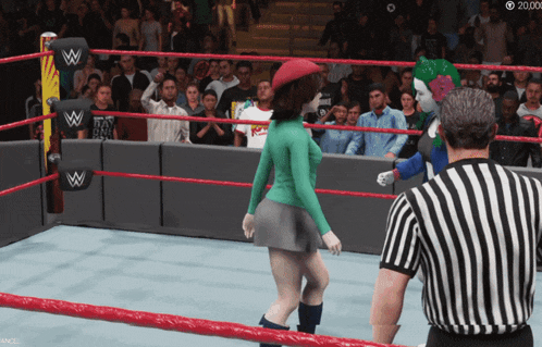 a wrestling ring with a sign that says ' wwe ' on it