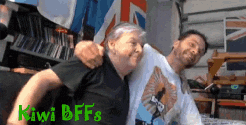 two men hugging each other with the words kiwi bffs on the bottom right
