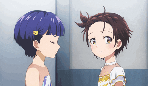 two anime girls are standing next to each other and one has a teddy bear on her hair