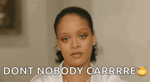a close up of a woman 's face with the words " dont nobody carrrre " written on the bottom