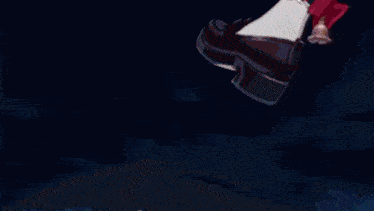 a woman 's foot with a red bow on it is standing on a blue sphere