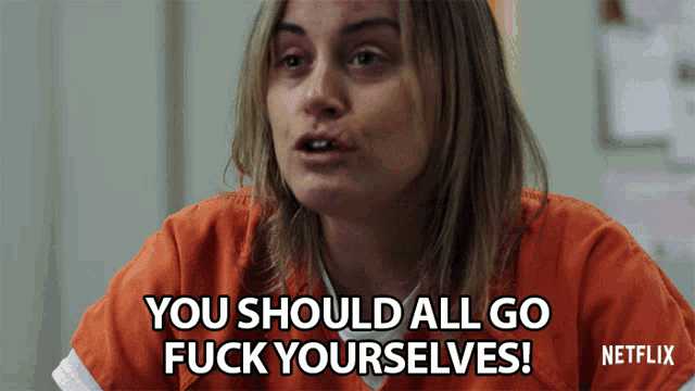 a woman in an orange uniform says you should all go fuck yourselfs