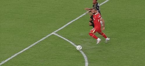 a soccer goal with a sign that says " ticketmash " on it