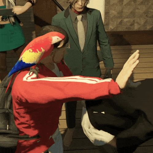 a man in a red jacket with a parrot on his shoulder