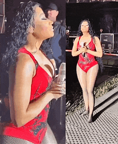 a woman in a red swimsuit is holding a microphone while standing on a stage .