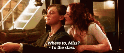 a man and a woman are sitting next to each other and the woman says where to miss to the stars .