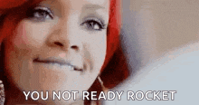 a close up of a woman 's face with the words `` you not ready rocket '' .