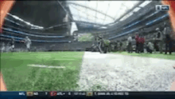 a football game is being played in a stadium with a scoreboard that says nfl