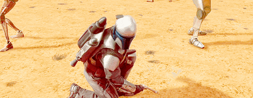 a man in armor with a gun stands in front of a group of people