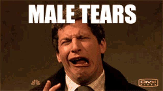 a man in a suit and tie is crying with the words male tears written above him