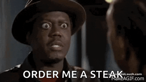 a man in a hat is talking to a woman and saying `` order me a steak '' .