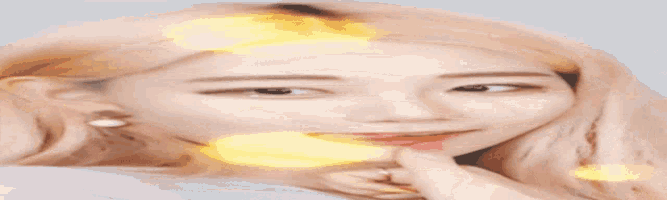 a close up of a woman with blonde hair