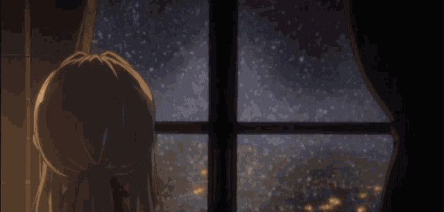 a snowy night in a city with palm trees