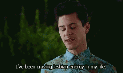 a man in a floral shirt is saying `` i 've been craving lesbian energy in my life '' .
