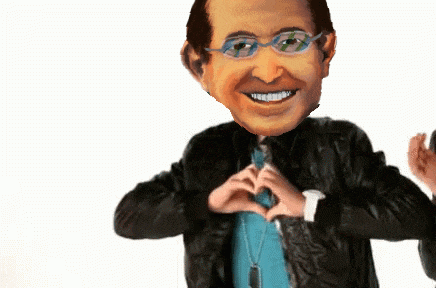 a man wearing glasses and a leather jacket making a heart shape with his hands