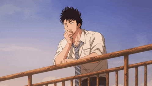 a man in a white shirt and tie leans on a railing