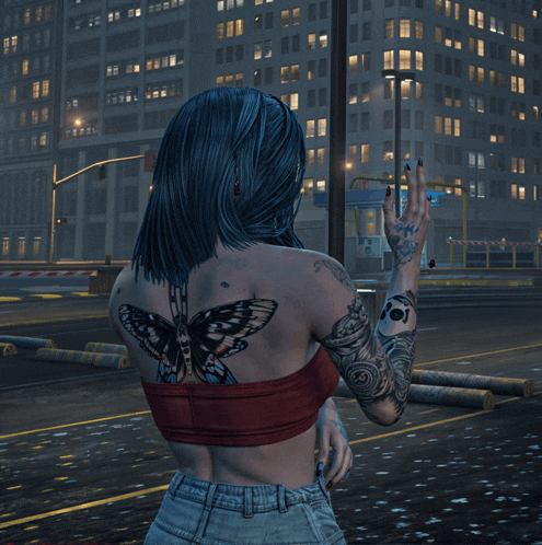 a woman with a tattoo of butterflies on her back