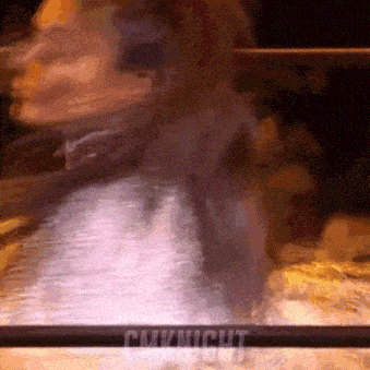 a blurry picture of a person with the words cmknight on the bottom right