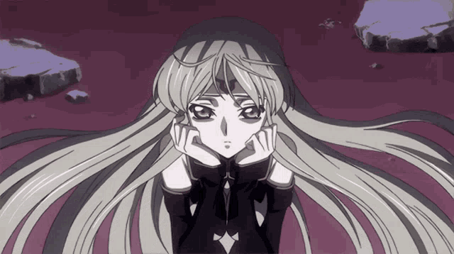 a girl with long blonde hair and a black shirt