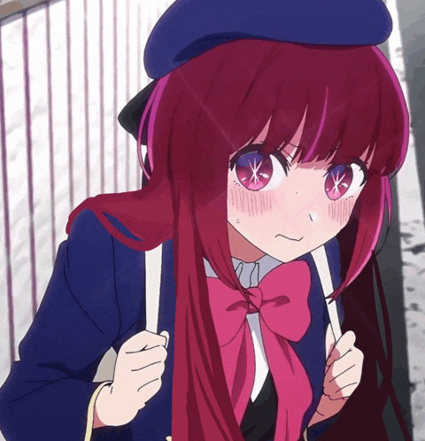 a girl with red hair is wearing a blue beret