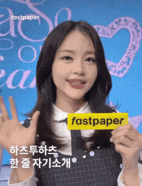 a girl holding a fastpaper sign in front of a blue background