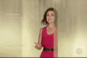 a woman in a red dress is standing in front of a door .