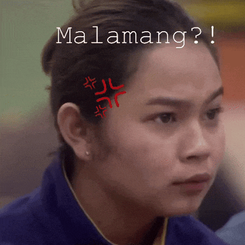 a woman with an angry look on her face has the word malamang written above her head