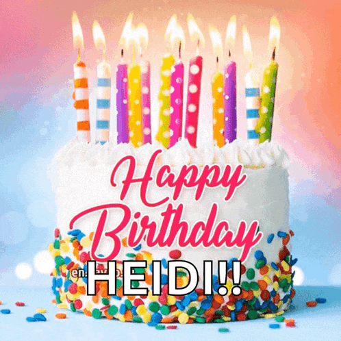 a birthday cake with candles and sprinkles and the name heidi on it