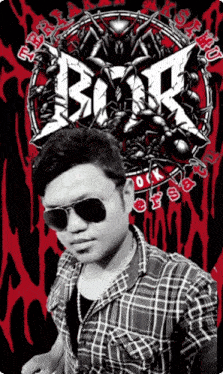 a man wearing sunglasses and a plaid shirt stands in front of a black and red background with a logo for a rock band