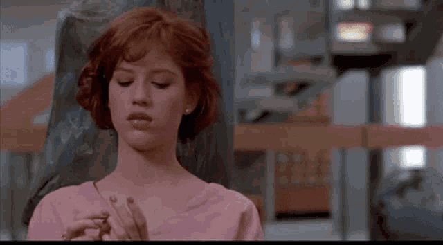 Dont Care Molly Ringwald GIF - Dont Care Molly Ringwald Roll Eyes GIFs