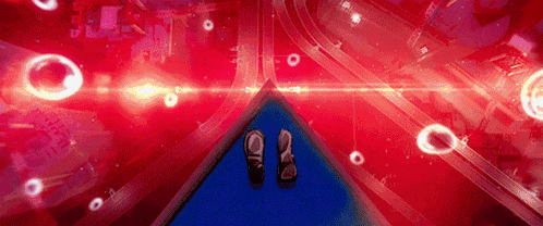 a person 's feet are visible in the middle of a red and blue scene
