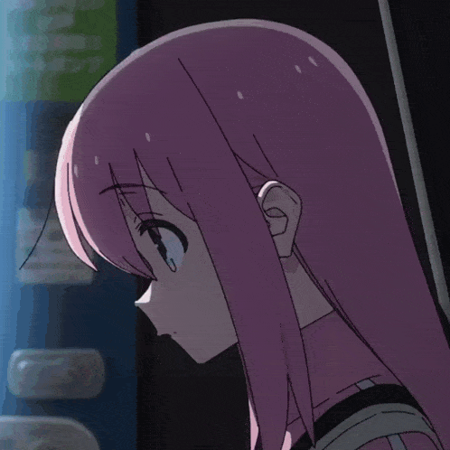 a close up of a pink haired anime girl 's face
