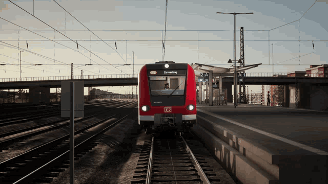 a red train with db written on the front of it