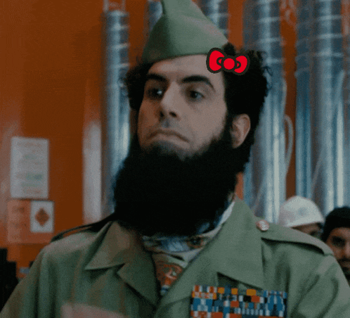 a man with a beard has a hello kitty on his hat