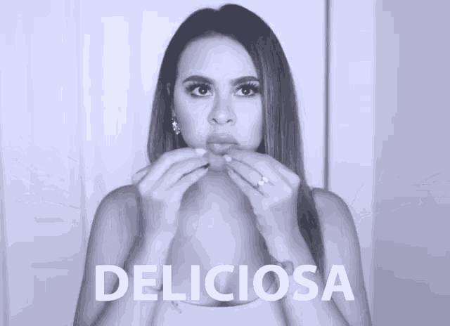 a black and white photo of a woman with the word deliciosa written on the bottom