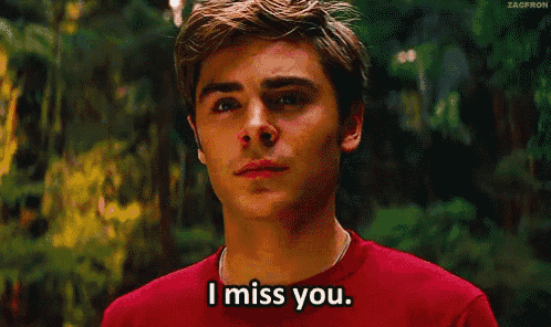 a young man in a red shirt says " i miss you "