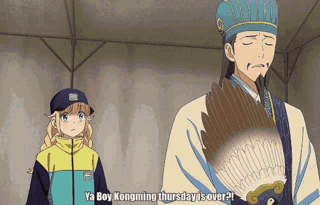 a man and a girl are standing next to each other and the man is holding a fan and the girl is wearing a fila jacket