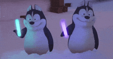 two husky penguins holding glow in the dark sticks in the snow